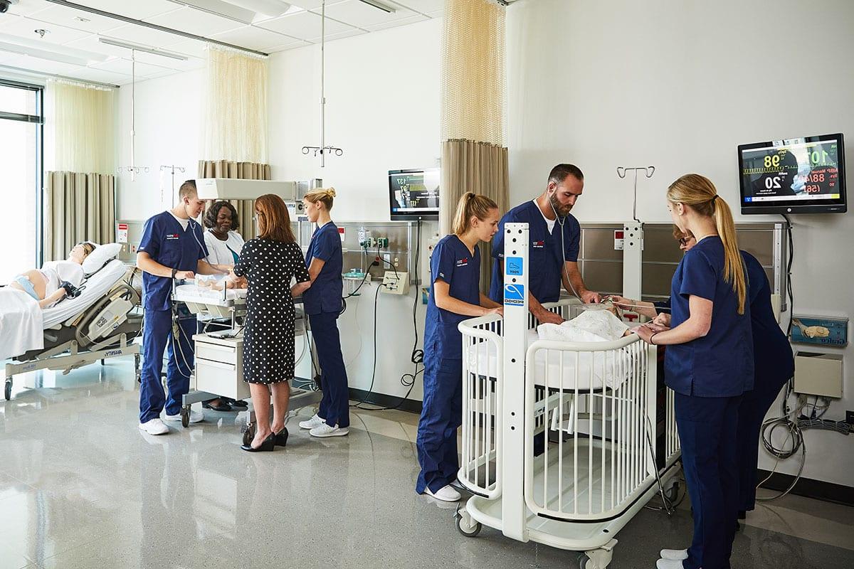 nursing students working in Walker Hall lab